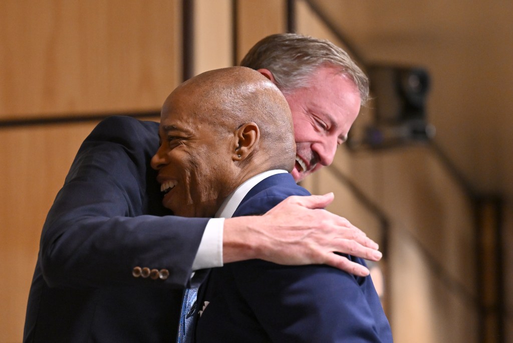 Eric Adams and Bill de Blasio. 