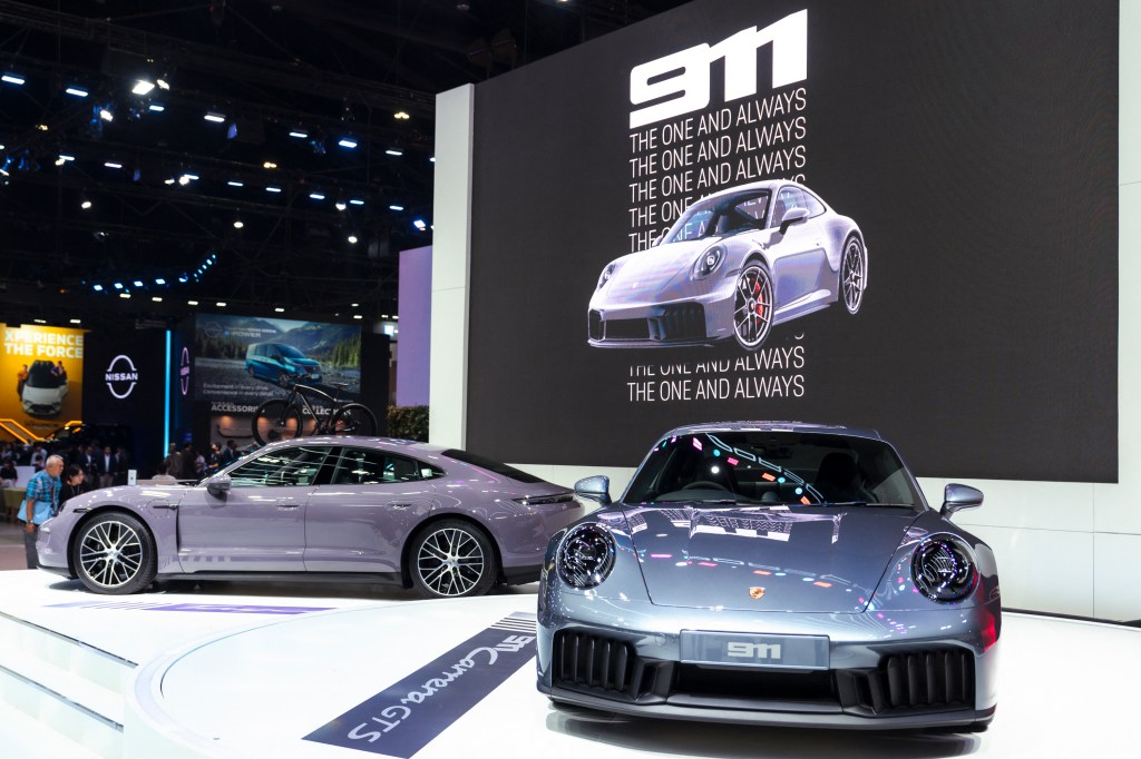 A Porsche Taycan is displayed at the 2025 Bangkok International Motor Show at the Impact Arena convention venue in Bangkok on March 24, 2025.