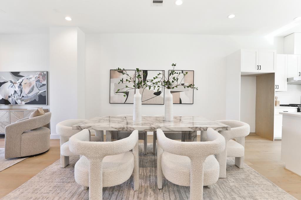 Broker Jamie Fallon reports overwhelming demand, with over 150 attendees at an open house.