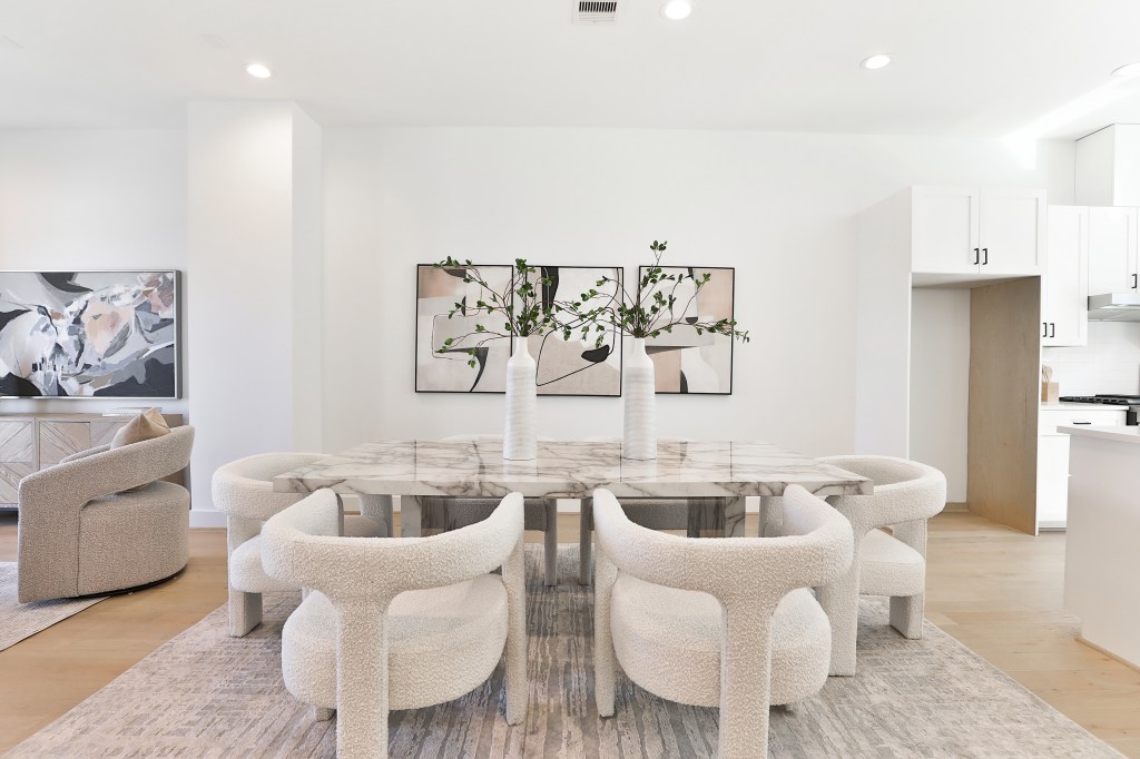Broker Jamie Fallon reports overwhelming demand, with over 150 attendees at an open house.
