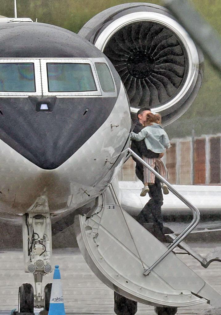 Rory McIlroy was seen arriving at George Best Belfast City Airport on Friday, stepping off his private Gulfstream jet with his daughter Poppy. 