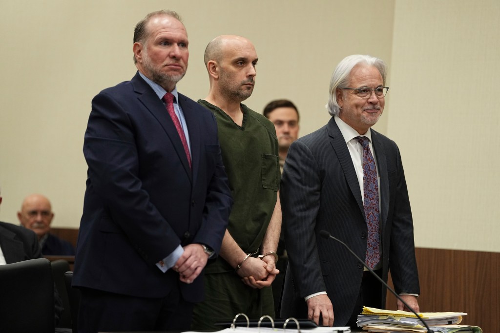Sean M. Higgins, the driver charged in the fatalities of the Gaudreau brothers, speaking at a microphone in front of the Salem County Courthouse.
