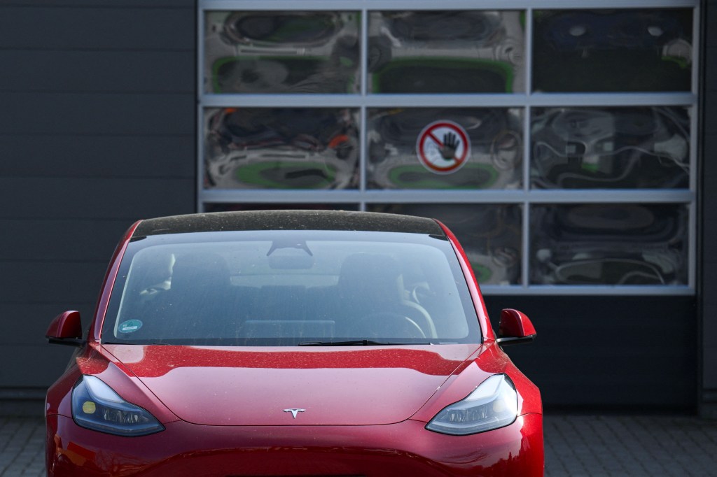 A Tesla electric vehicle parked at a Tesla dealership in Berlin, Germany.