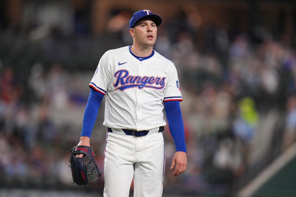 Texas Rangers starting pitcher Patrick Corbin looks on after pitching to the Los Angeles Angels during the second inning of a baseball game Wednesday, April 16, 2025