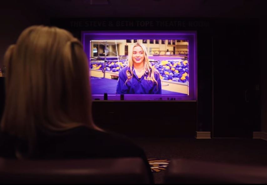 Olivia Dunne watches her tribute video.