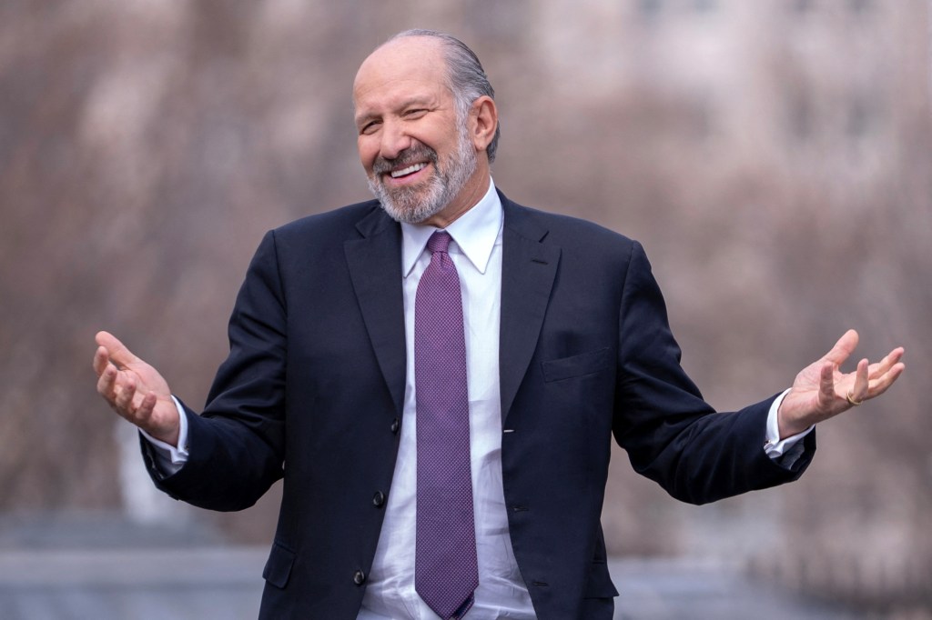 U.S. Commerce Secretary Howard Lutnick speaking to the media near the White House in Washington, D.C., March 13, 2025.