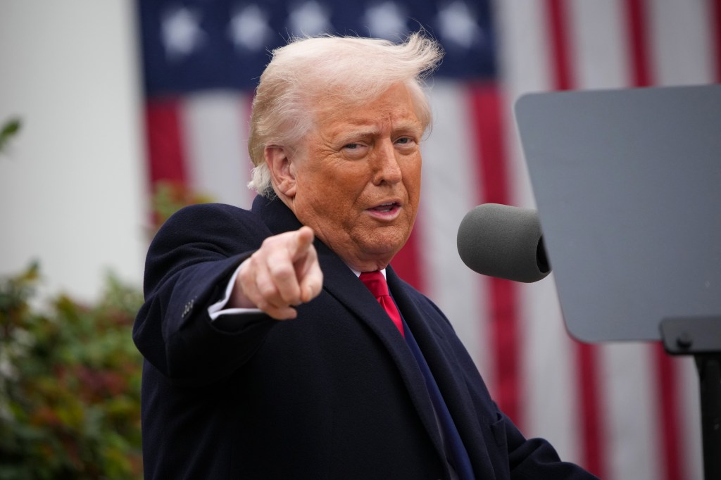 President Donald Trump gesturing while speaking at the 'Make America Wealthy Again' trade announcement event in the White House Rose Garden