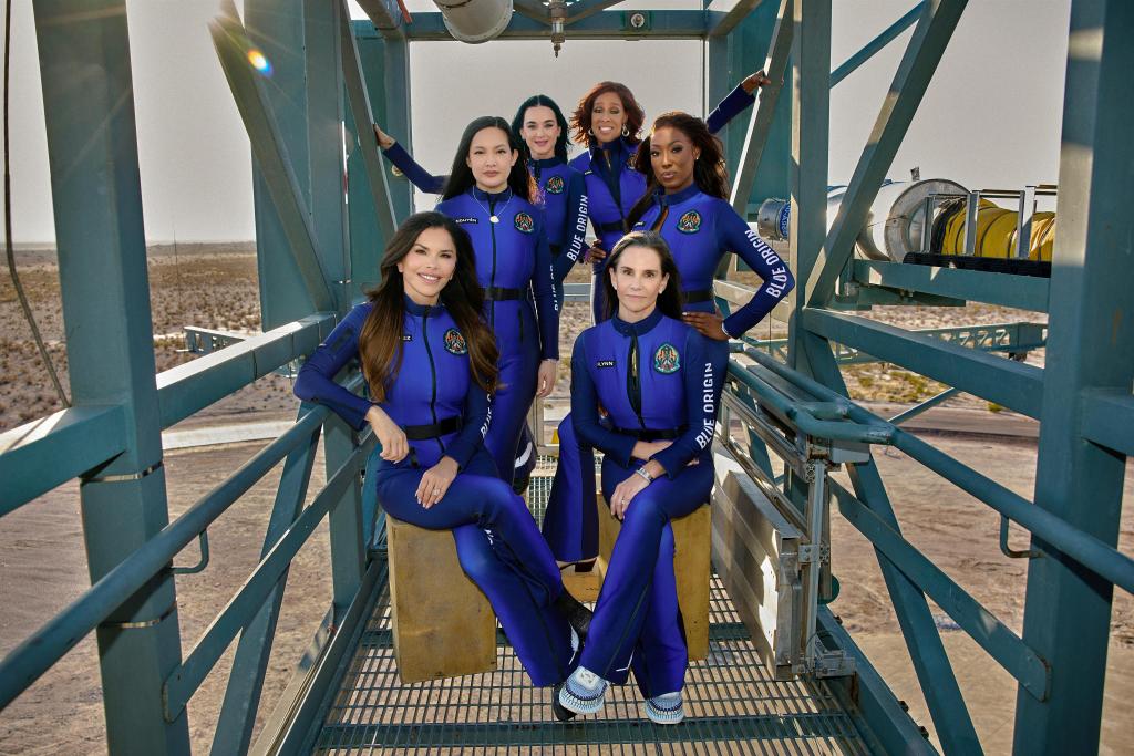 Lauren Sanchez, Amanda Nguyen, Katy Perry, Gale King, Aisha Bowe, and Kerianne Flynn in space suits posing before their all-woman sub-orbital mission with Blue Origin