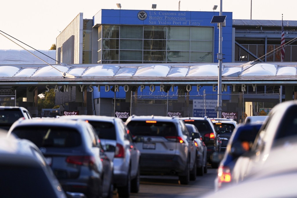 Vehicles wait to cross the border into the United States at the San Ysidro Port of Entry in Tijuana, Mexico on March 18, 2025. 
