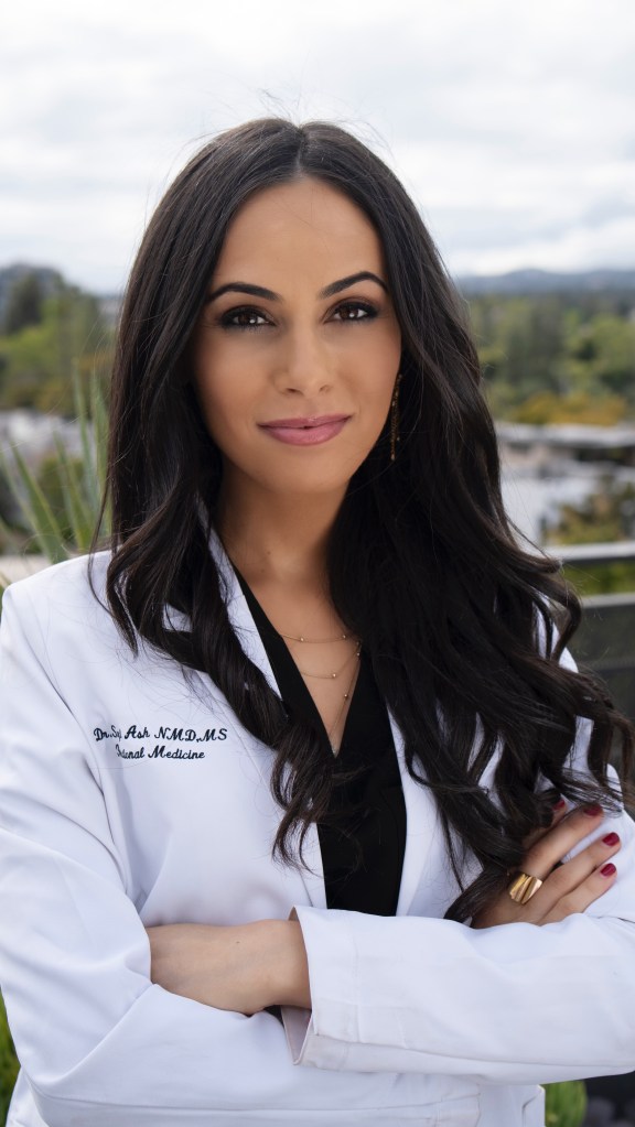 Ash, 31, said her hacks have translated to a biological age of 26. This is her headshot.