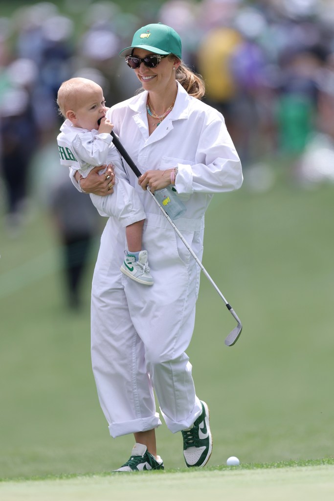 Meredith Scheffler and son Bennett served as caddies in the Par 3 event.