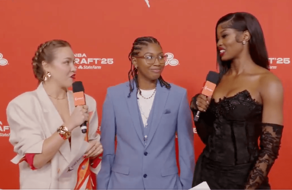 Shyanne Sellers looks at Rickea Jackson as Hannah O'Flynn misintroduces her. 