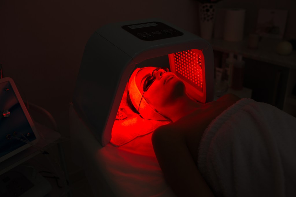 Red-light therapy helps ease inflammation, Ash said. A woman is shown here undergoing red-light therapy.