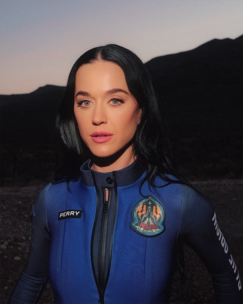 Katy Perry wearing a blue jumpsuit as part of the first all-women crew to visit space since 1963