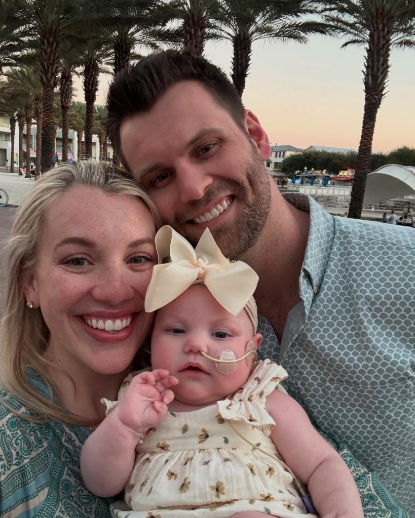 A man and woman, Influencer Lauren Cummings Johnson and her husband Wilson Johnson, mourning with their baby girl