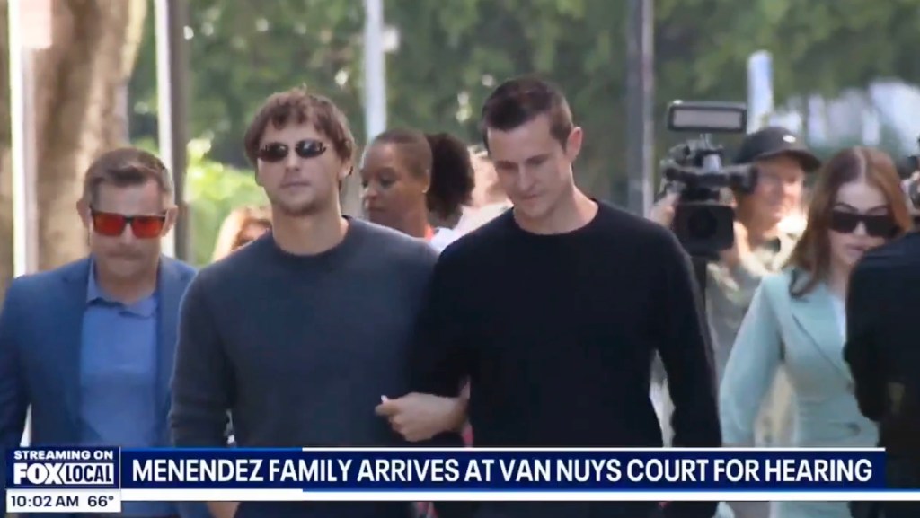 Cooper Koch and Stuart McClave attending Menendez brothers resentencing hearing, walking down a street