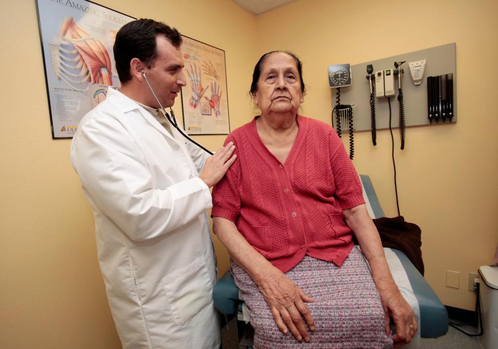 Dr. Carlos Ruvalcaba examining patient Paula Medrano, an undocumented immigrant, at the Clinica Sierra Vista Elm unit in Fresno, California in 2010.