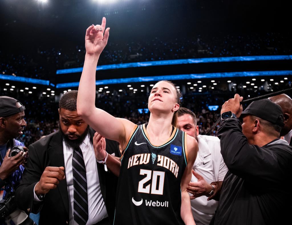 Sabrina Ionescu #20 of the New York Liberty celebrates as the New York Liberty defeat Minnesota Lynx during Game 5 of the 2024 WNBA Finals to win their first championship.