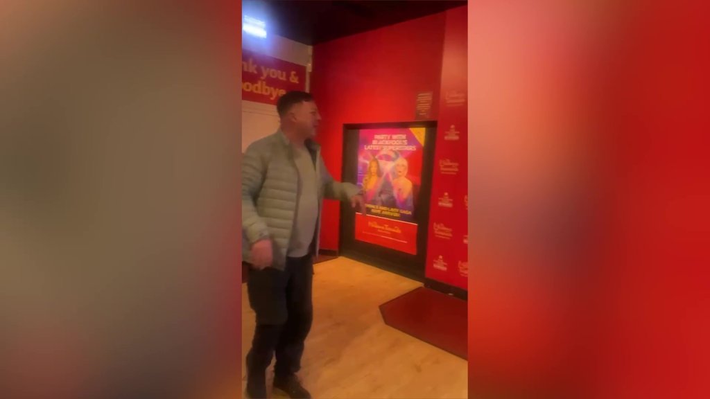 Video grab of Michelle Robinson and Stephen Robinson trapped inMadame Tussauds in Blackpool, Lancs.