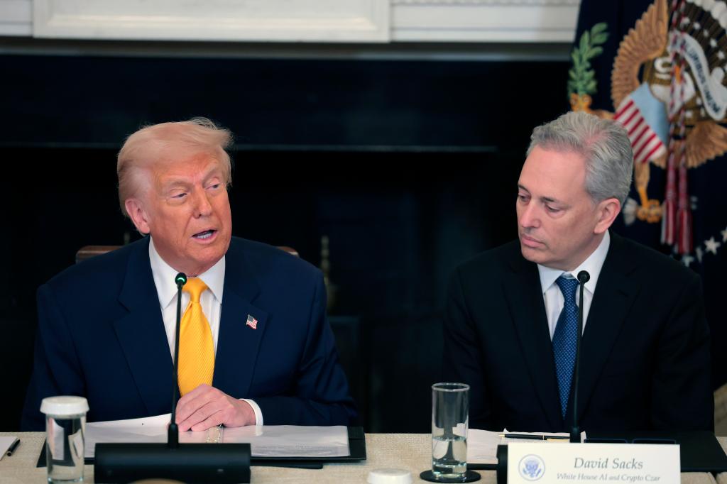 President Donald Trump and White House Crypto Czar David Sacks speak at the The White House Digital Assets Summit at the White House on March 07, 2025 in Washington, DC. 