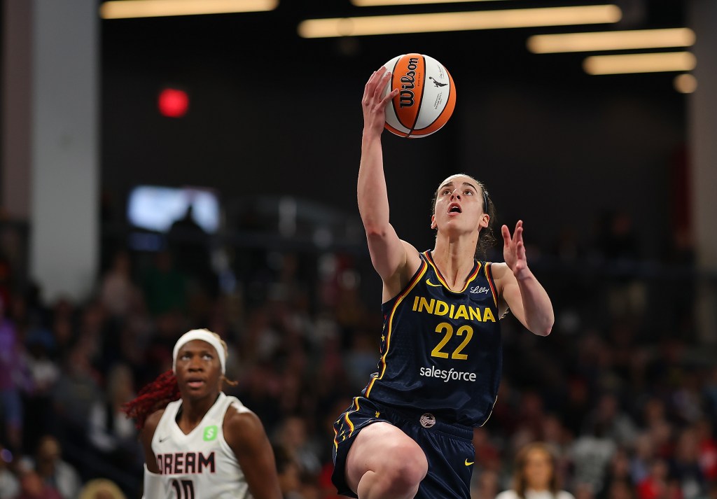 Caitlin Clark #22 of the Indiana Fever drives to the basket against the Atlanta Dream during the first quarter of a preseason game at Gateway Center Arena on May 10, 2025 in College Park, Georgia. 