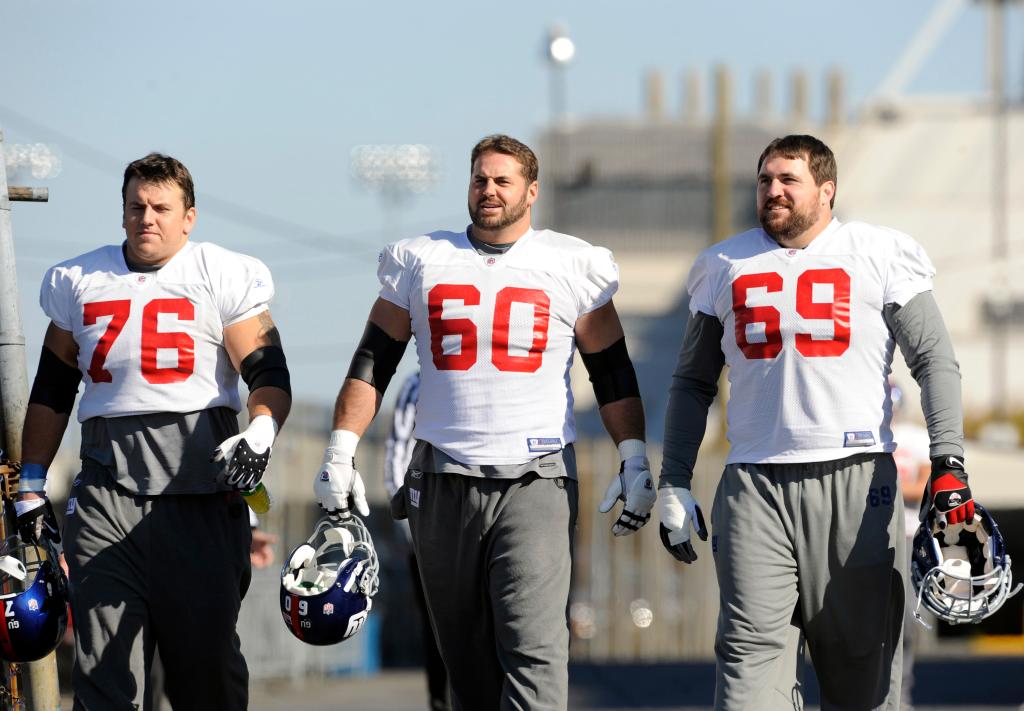 Giants Offensive Linemen (l-r); #76 Chris Snee, #60 Shaun O'Hara and #69 Rich Seubert walking to the practice field at Giants Stadium in East Rutherford New Jersey.