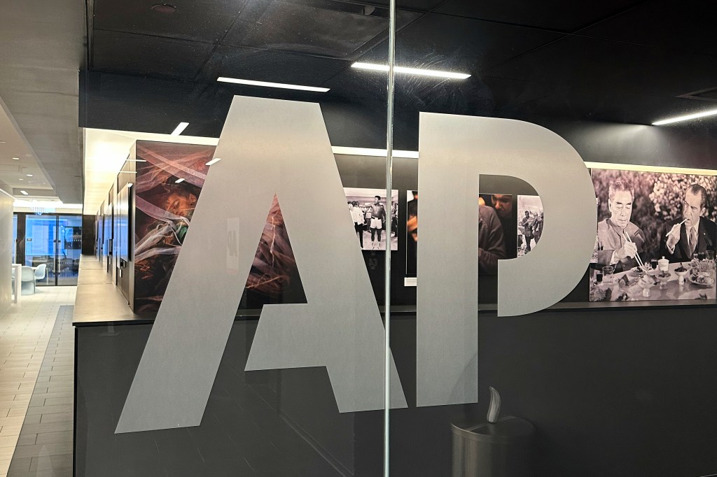 There were no reporters from the Associated Press aboard Air Force One during Trump's trip.