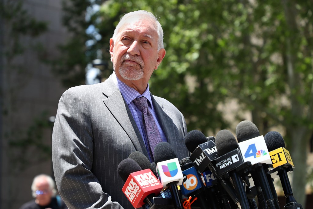 Defense attorney Mark Geragos and lawyer Bryan Freedman speaking to the press outside Van Nuys Superior Court for the resentencing hearing of Erik and Lyle Menendez, Los Angeles, California, 13 May 2025.
