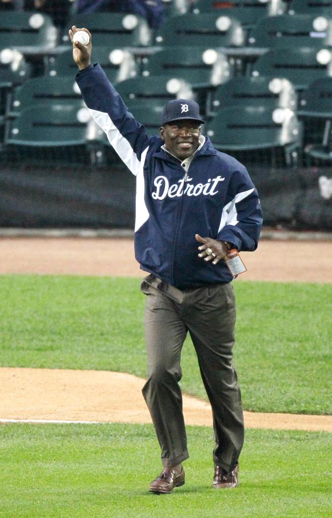 Former Detroit Tiger Chet Lemon acknowledging the crowd while walking to the mound for a ceremonial first pitch in a baseball game in 2011.