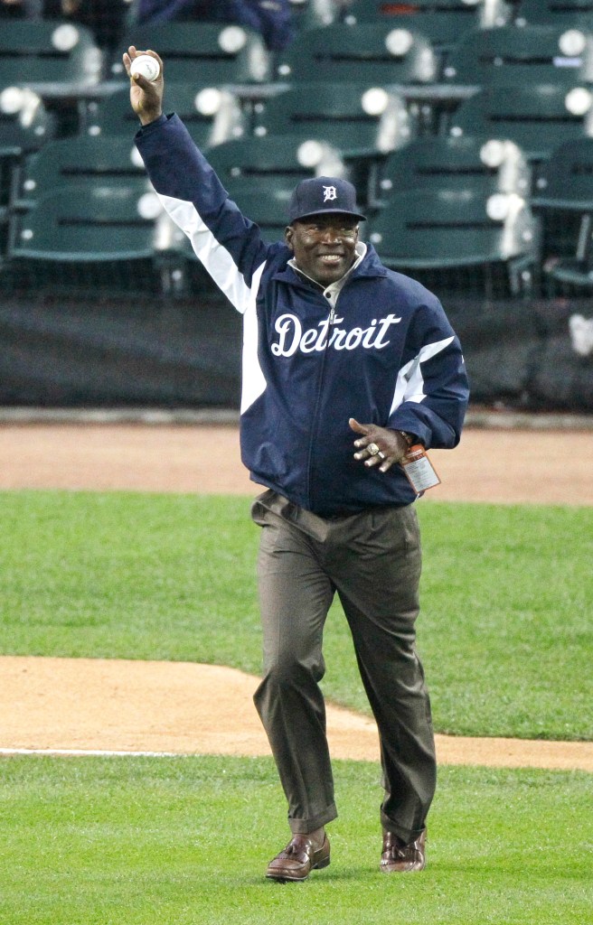 Former Detroit Tiger Chet Lemon acknowledging the crowd while walking to the mound for a ceremonial first pitch in a baseball game in 2011.