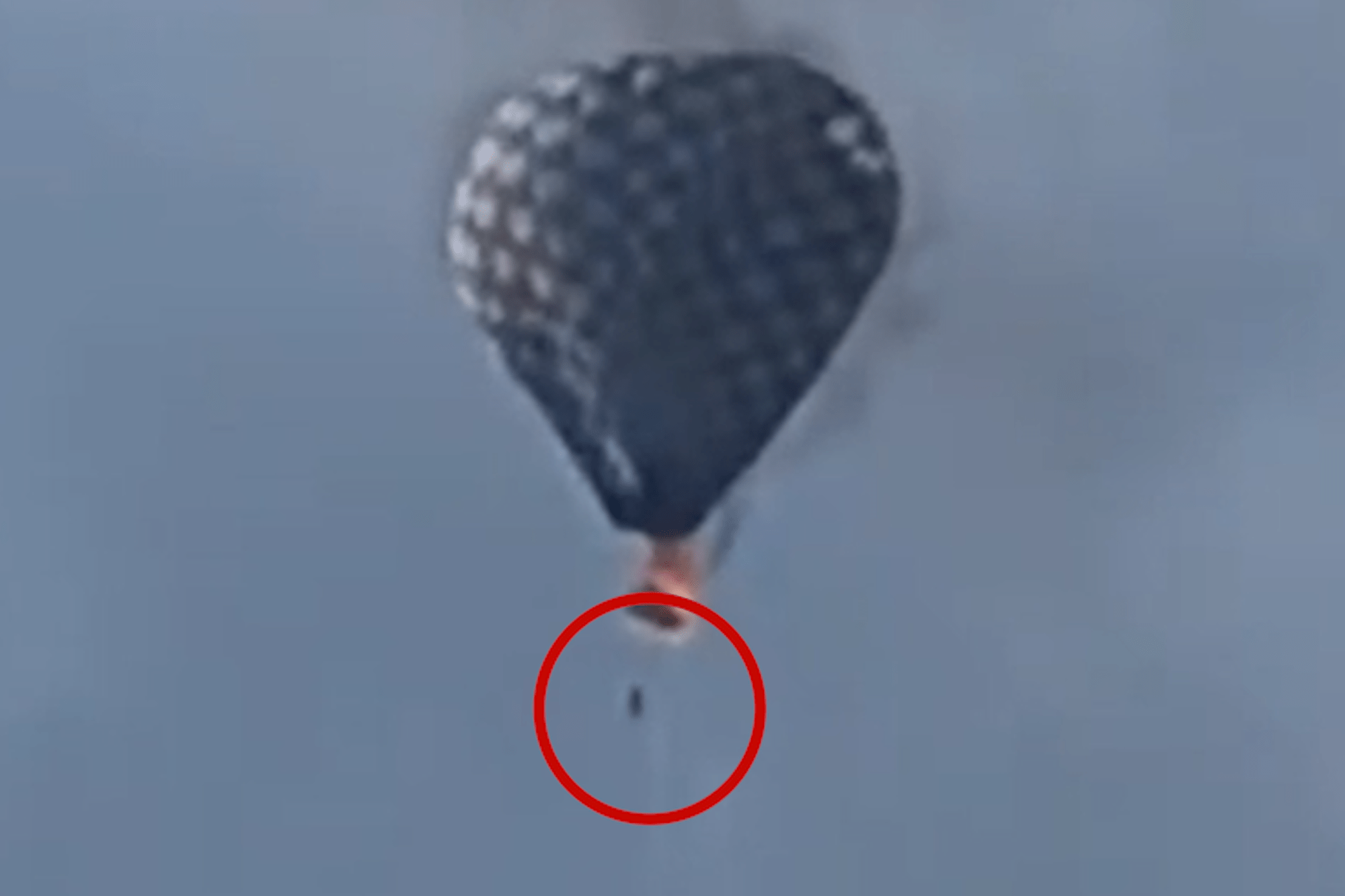 Harrowing video shows man dangling from hot air balloon before falling to his death