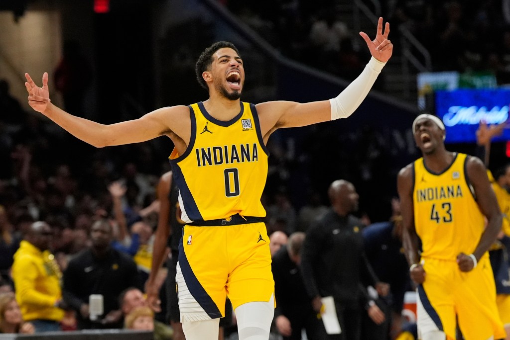 Pacers guard Tyrese Haliburton, left, celebrates along with forward Pascal Siakam after scoring during the second half in Game 5 of an Eastern Conference semifinal NBA basketball playoff against the Cleveland Cavaliers, Tuesday, May 13, 2025
