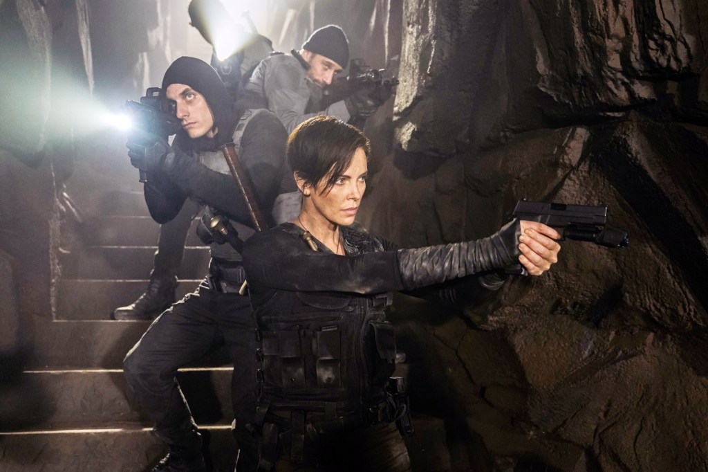 Matthias Schoenaerts, Luca Marinelli, and Charlize Theron in "The Old Guard."