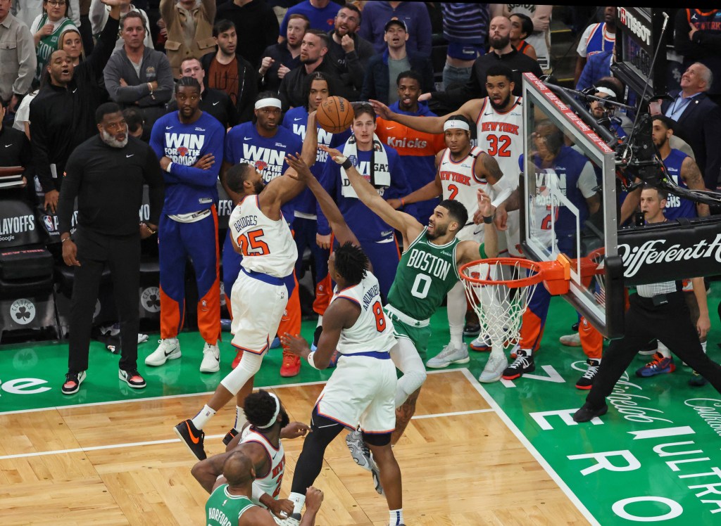 Knicks forward Mikal Bridges steals the ball from Boston Celtics forward Jayson Tatum with time expiring as the Knicks beat the Celtics to lead the series 2-0.
