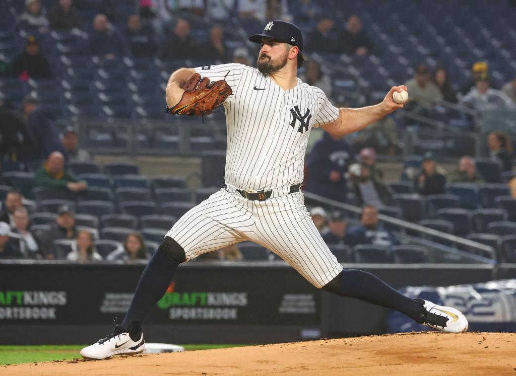 Yankees pitcher Carlos Rodón (55) pitches against the Padres.