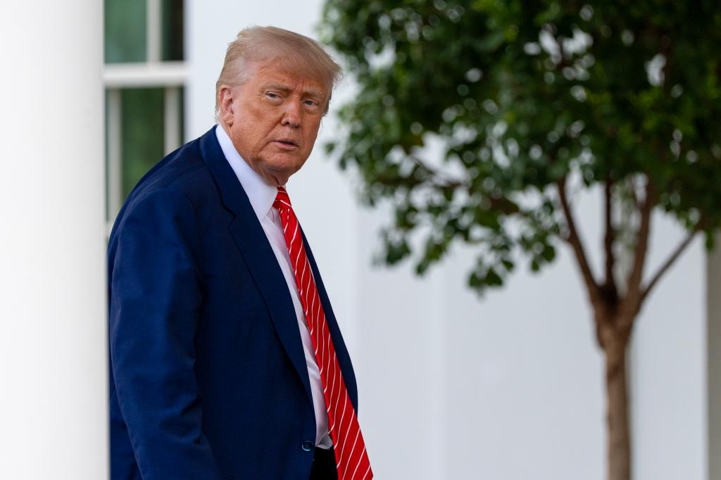 President Donald Trump speaks with reporters in front of the West Wing of the White House, Thursday, May 8, 2025, in Washington.
