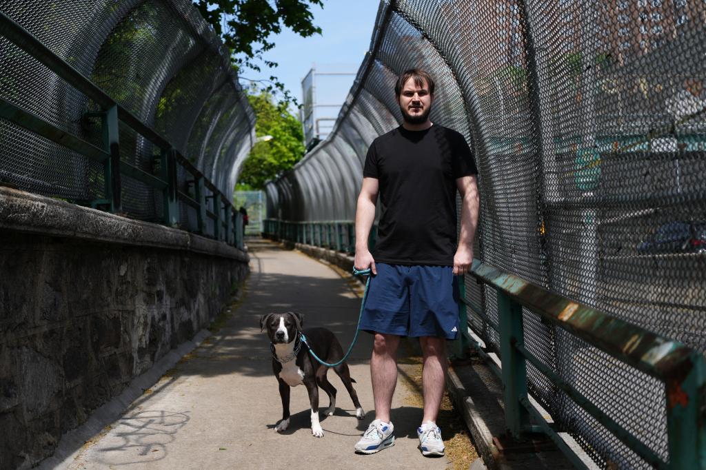 Sam Wolgemuth, with his dog Apollo, spoke to the New York Post by the closed bicycle path on the Hudson River Greenway near the George Washington Bridge, shut down due to ongoing reconstruction on Thursday, May 1, 2025 in New York, N.Y. 
