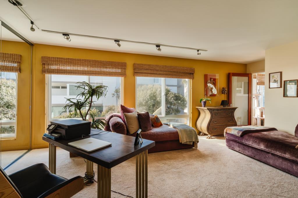 One of just three in the 1974-built building— the condo sits directly on the sand.