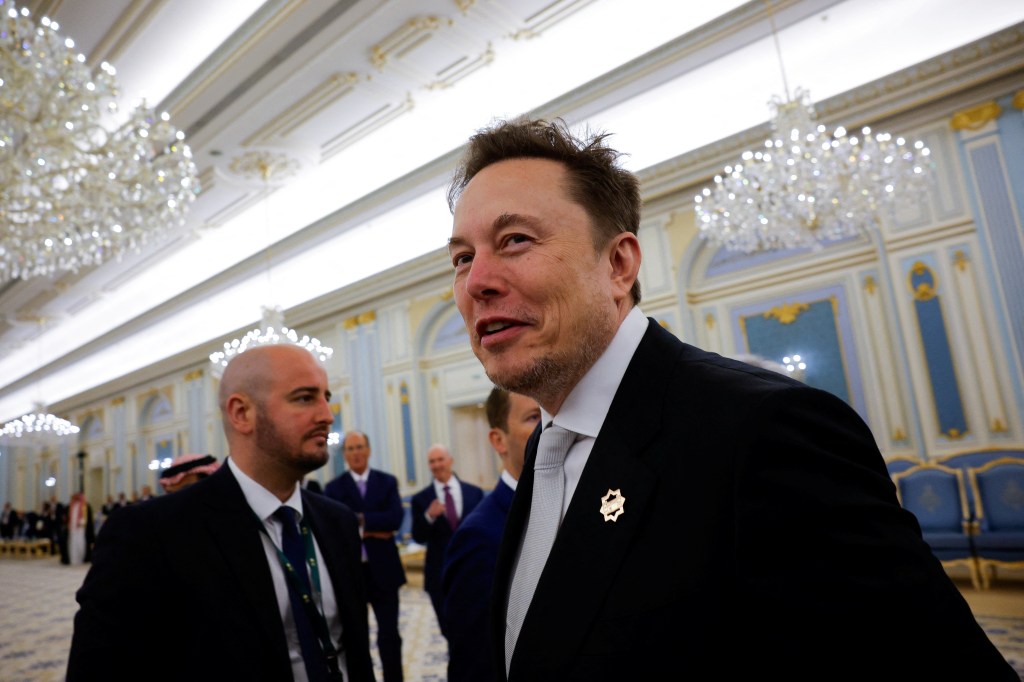 Tesla CEO Elon Musk looks on as he visits Riyadh with President Donald Trump, in Riyadh, Saudi Arabia, May 13, 2025. 