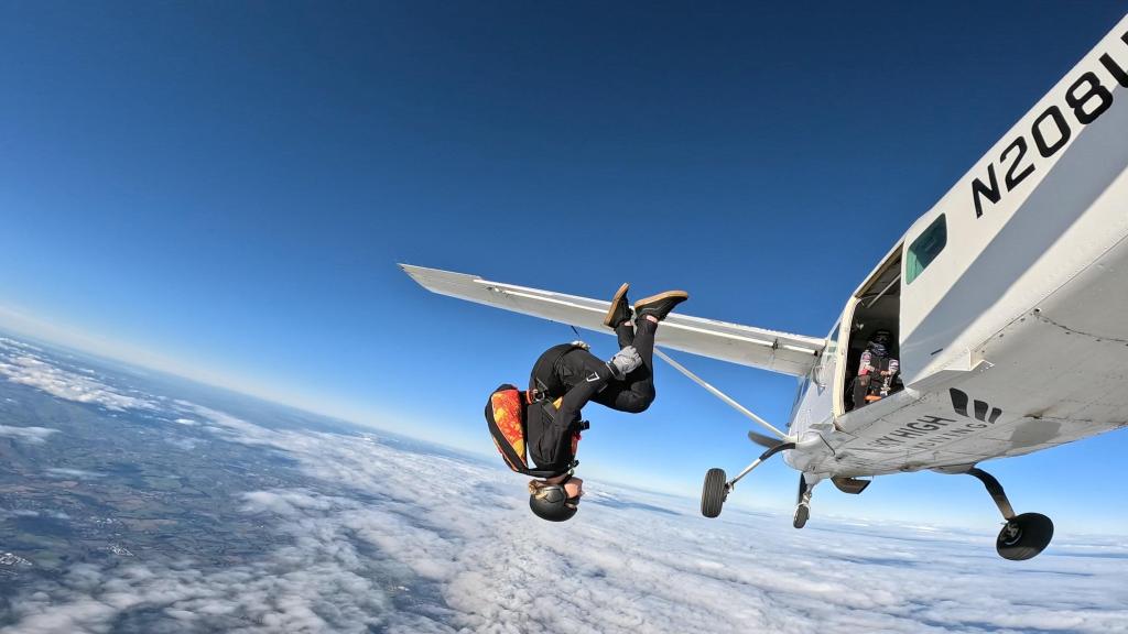 Damarell jumping out of a plane