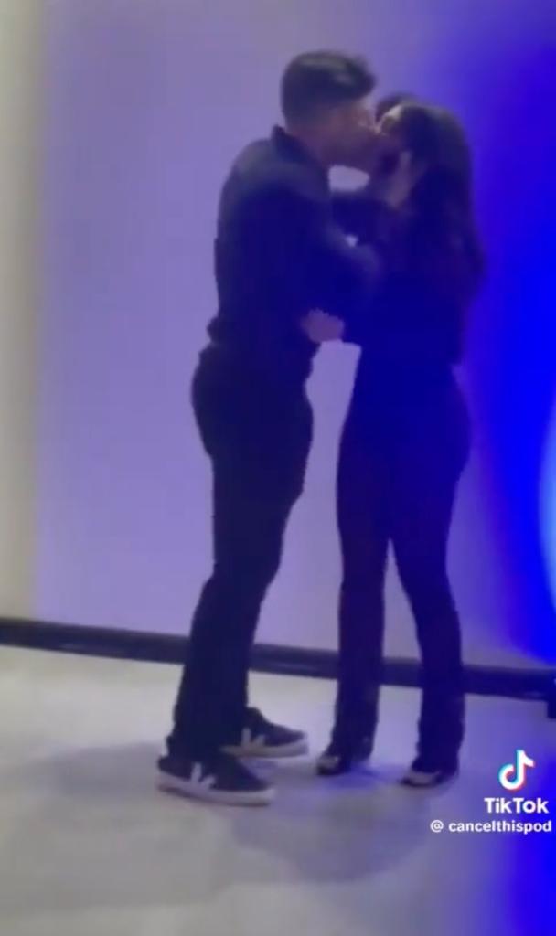 A screengrab from the now infamous video, showing the couple kissing.