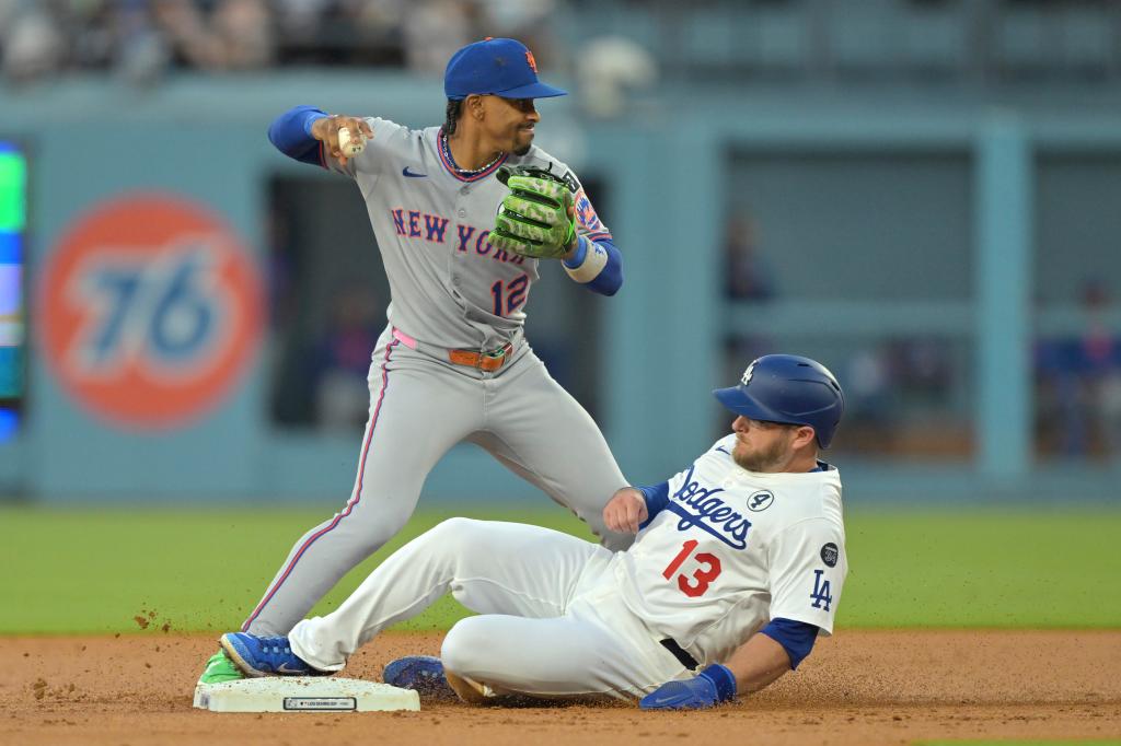 Francisco Lindor forces out Max Muncy to complete a double play during the second inning of the Mets' extra-inning win over the Dodgers on June 2, 2025.