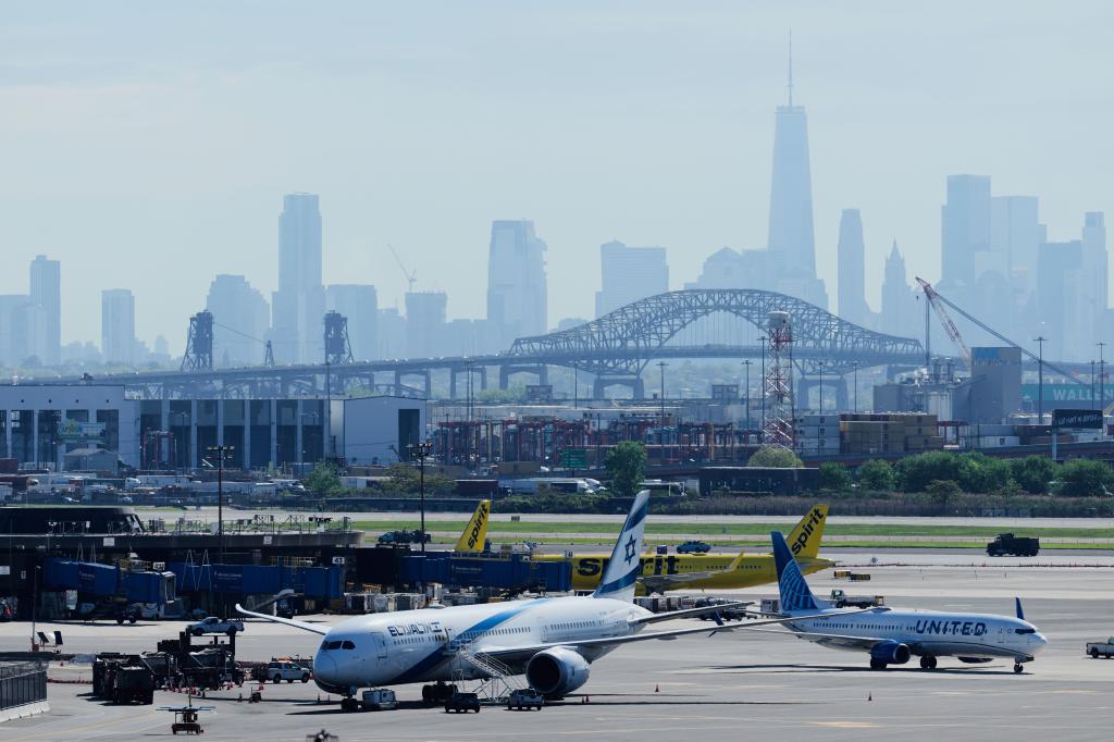 Newark Liberty International Airport with New York City skyline in the background.