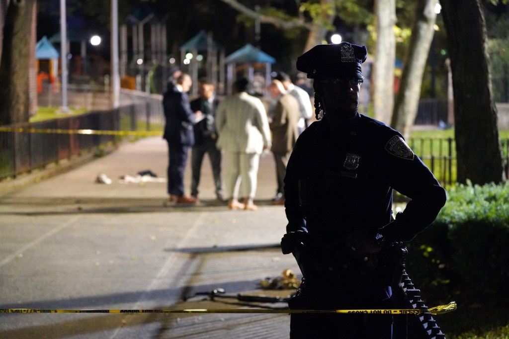 NYPD officer at a crime scene.