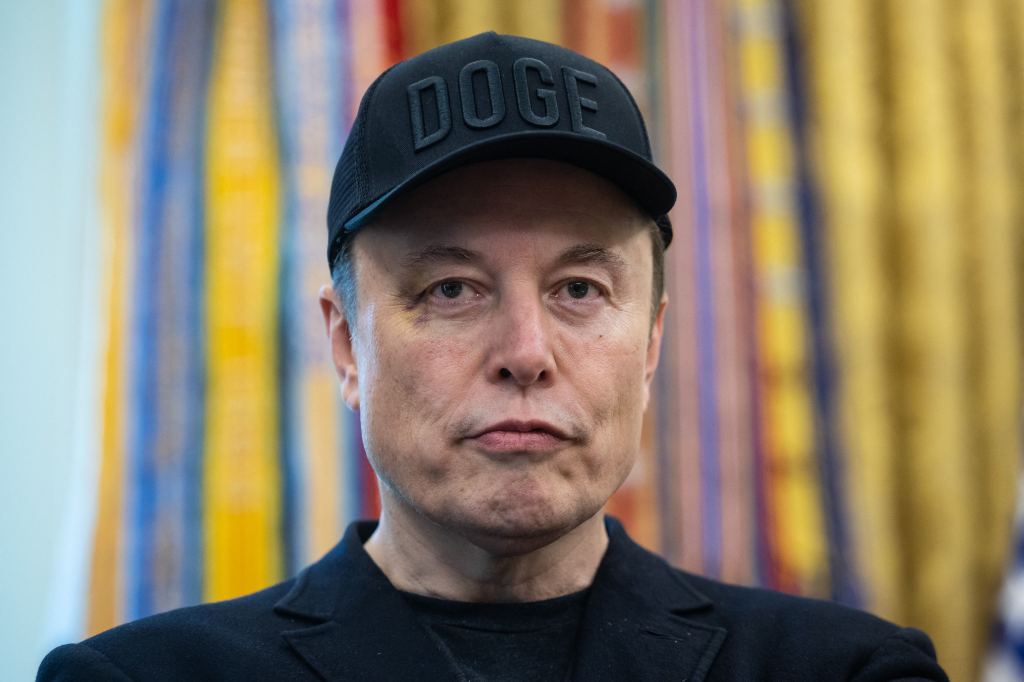 Elon Musk at a press conference with President Trump in the Oval Office.
