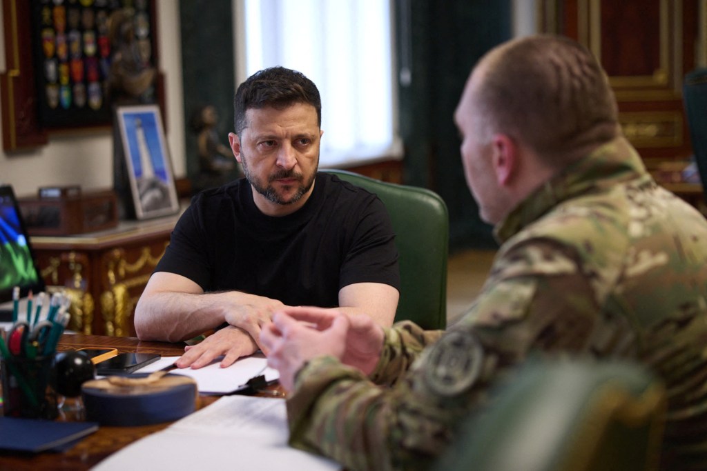 Ukraine's President Volodymyr Zelenskiy and Head of the Security Service of Ukraine Vasyl Maliuk attend a meeting, amid Russia's attack on Ukraine, in Kyiv, Ukraine, in this handout picture released June 1, 2025.