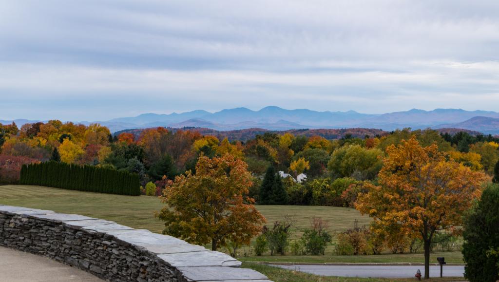 Autumn foliage and Adirondack Mountains viewed from an overlook.
