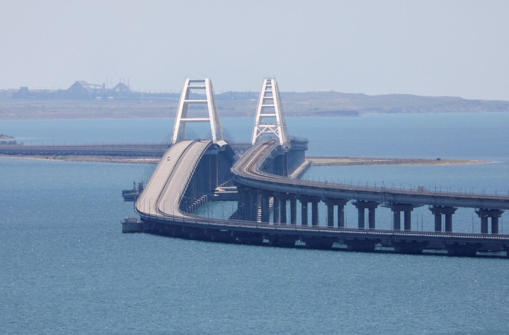 The Crimean Bridge damaged after an alleged attack.